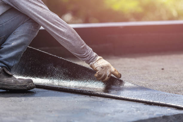Professional Basement Waterproofing technician working in Marion, VA